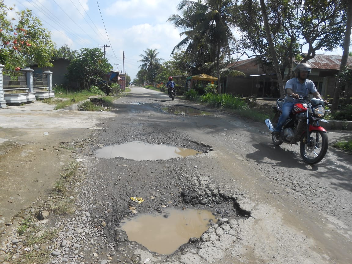 Pengerjaan Pengaspalan Jalan Di Desa Sidomulyo Kabupaten Langkat Tidak Transparan