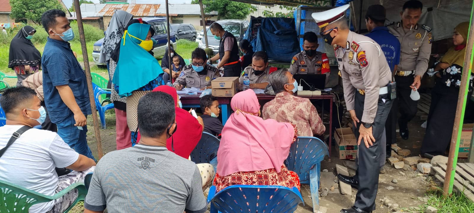 Satlantas Polres Pelabuhan Belawan Laksanakan Monitoring Vaksinasi dan Pengerahan Massa Door to Door