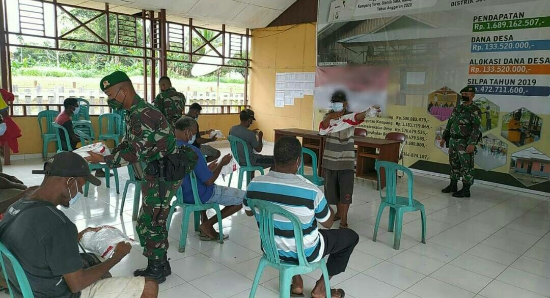 Satgas Pamtas Yonif 125 Sosialisasi Bela Negara Kepada Perangkat Kampung dan Linmas