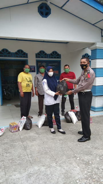 Kasat Lantas Polres Labuhanbatu berikan Tali  Asih kepada PHL Lantas