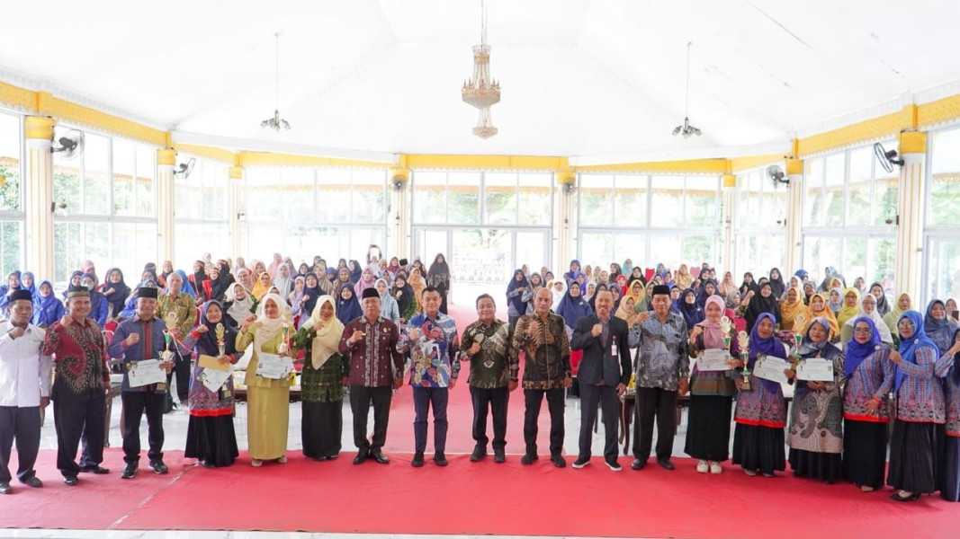 Pj. Bupati Langkat Dorong Guru Jadi Pemimpin Inspiratif di Seminar Hari Guru ke - 79