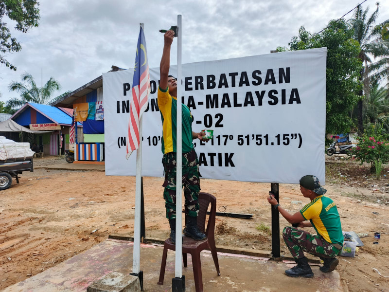 Satgas Pamtas Yonarmed 11 Kostrad Laksanakan Pemeliharaan Patok Batas Negara