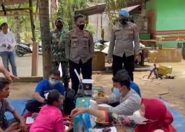 Polres Labuhanbatu melaksanakan Vaksinasi dosis I, II dan III (Booster) di Dusun Perjuangan Indah da