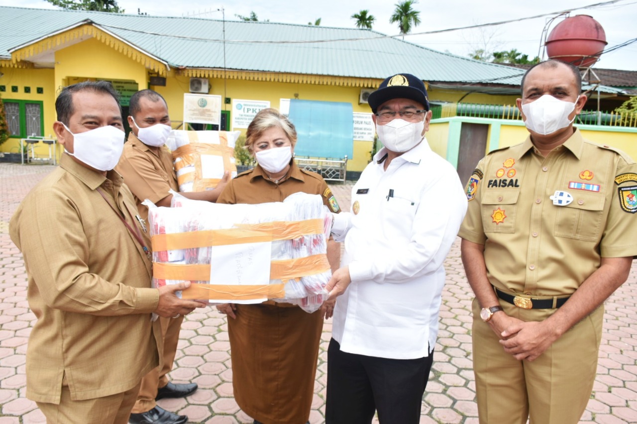Peringati HKN ke-56, Pemkab Sergai Bagikan Masker Kepada ASN dan Masyarakat 