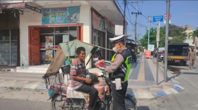 Laksanakan Patroli Yustisi, Polresta Deli Serdang Antisipasi Penyebaran Wabah Covid-19