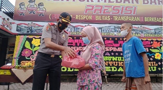 Kapolsek Kompol Aris Wibowo SIK MH Beri Tali Asih Kepada Anak Yatim Piatu