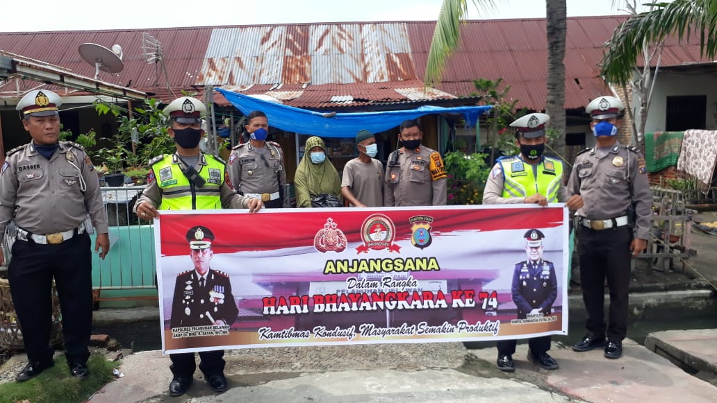 Satlantas Polres Belawan Giat Ajangsana Beri Bantuan Bansos